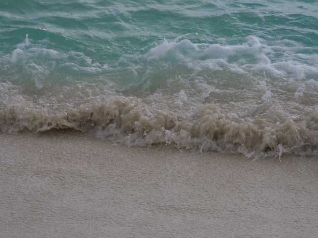Waves lapping on sand